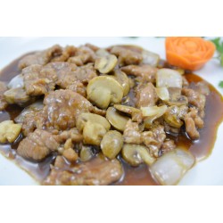 Ternera con champiñones